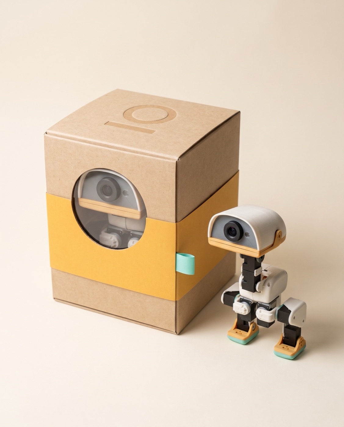 Concept: ivory rigid box with an amber band and a round window